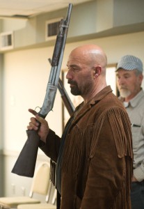Kevin with weapons master (production still)